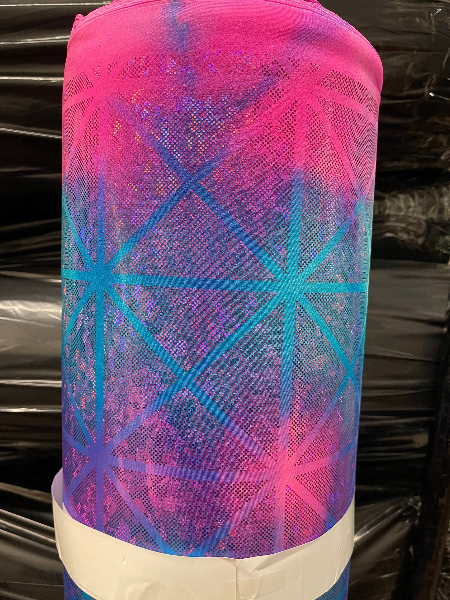 Tie dye Geometric desing hologram tie dye nylon spandex 4way  58/60" sold by the yd. Ships worldwide from Los Angeles California USA