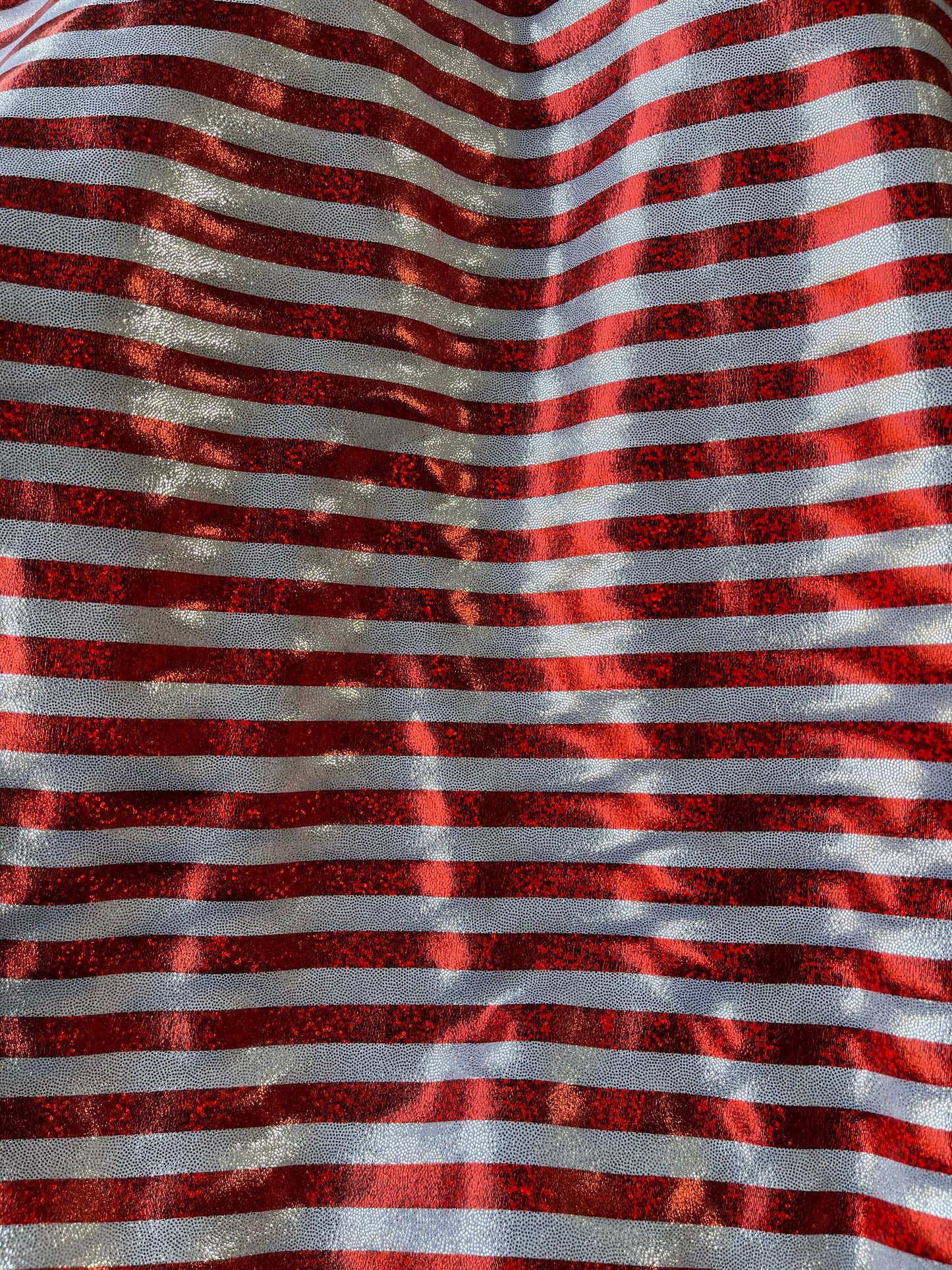 Stripes design Freedom American stripes metallic nylon spandex with foggy foil 4-way stretch 58/60” Sold by the YD. Ships Worldwide