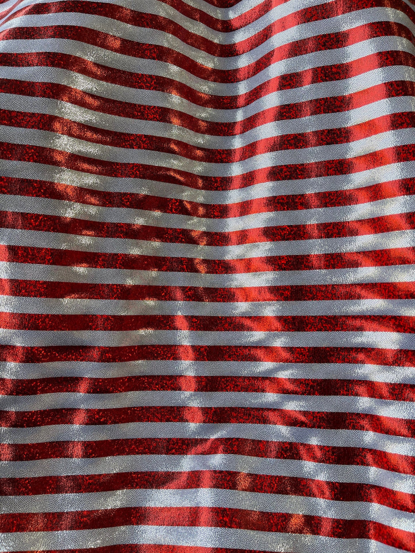 Stripes design Freedom American stripes metallic nylon spandex with foggy foil 4-way stretch 58/60” Sold by the YD. Ships Worldwide