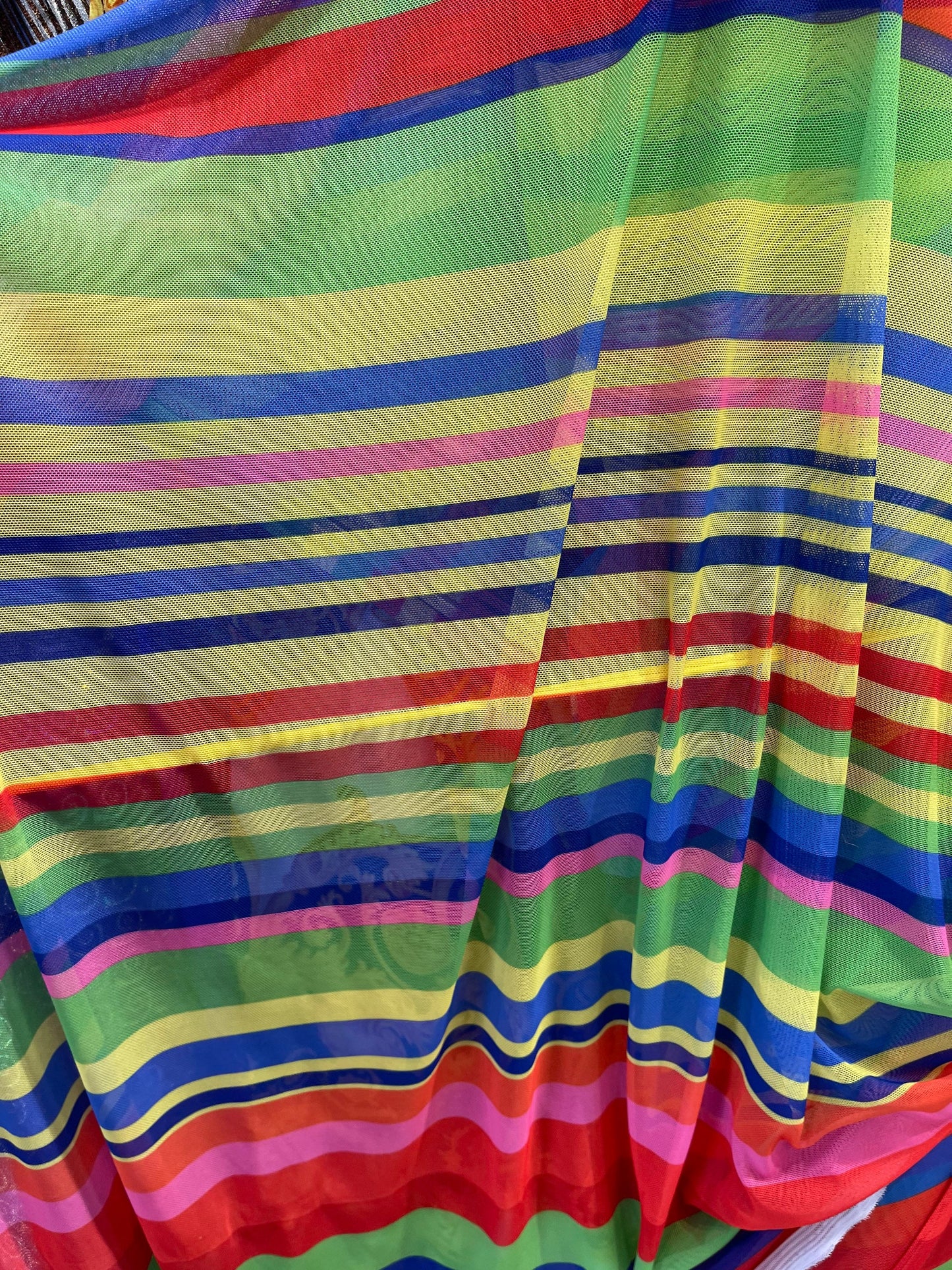 New stripe design rainbow print on power mesh 4-way stretch 58/60” Sold by the YD. Ships Worldwide from Los Angeles California USA.