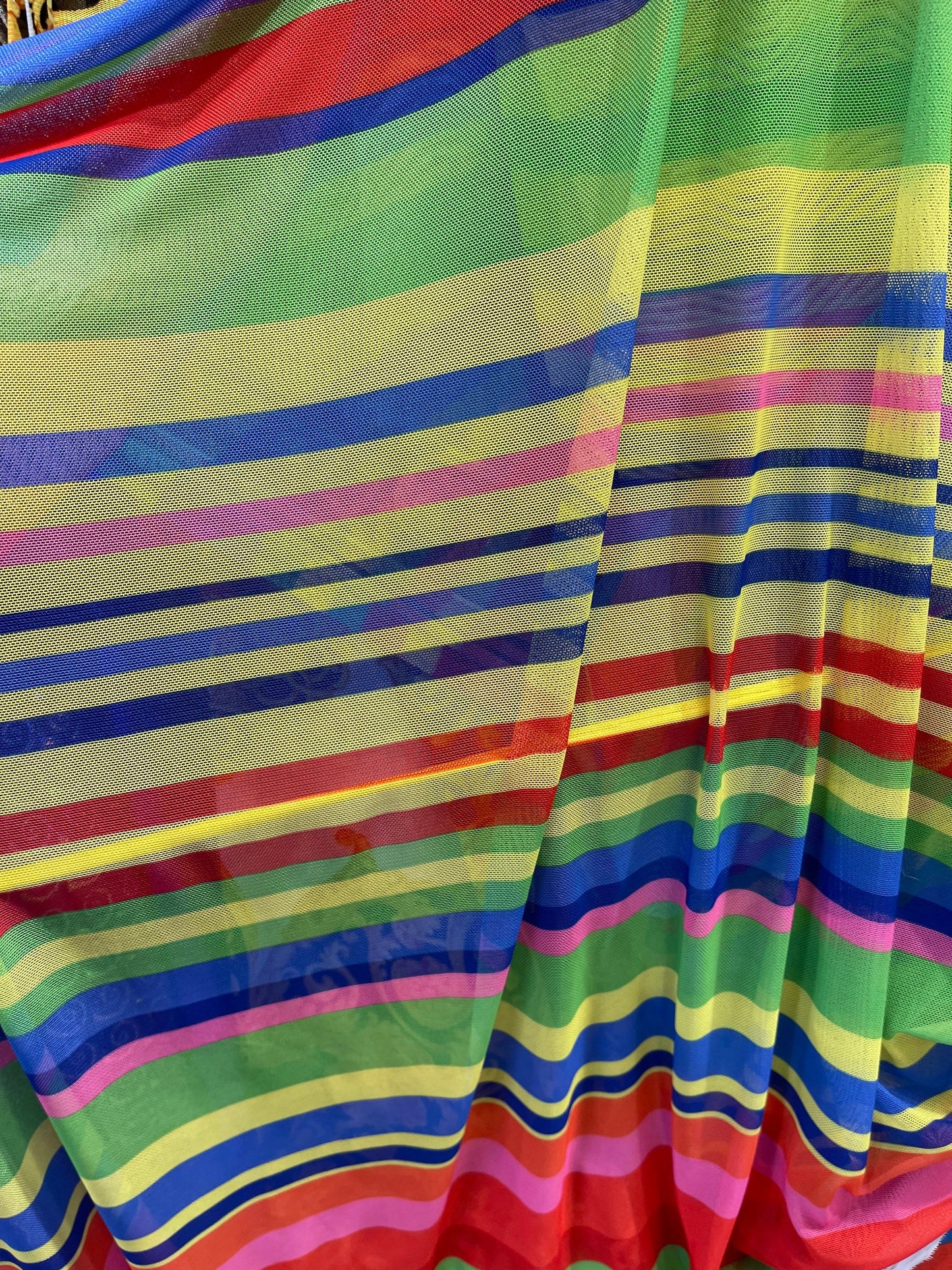 New stripe design rainbow print on power mesh 4-way stretch 58/60” Sold by the YD. Ships Worldwide from Los Angeles California USA.