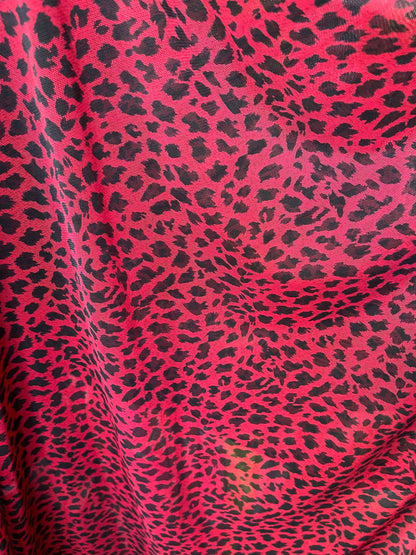 New power mesh animal print leopard design red/black 4-way stretch 58/60” Sold by the YD. Ships worldwide from Los Angeles California USA.