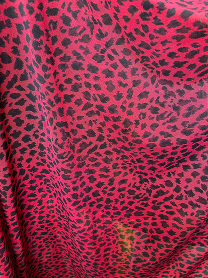 New power mesh animal print leopard design red/black 4-way stretch 58/60” Sold by the YD. Ships worldwide from Los Angeles California USA.