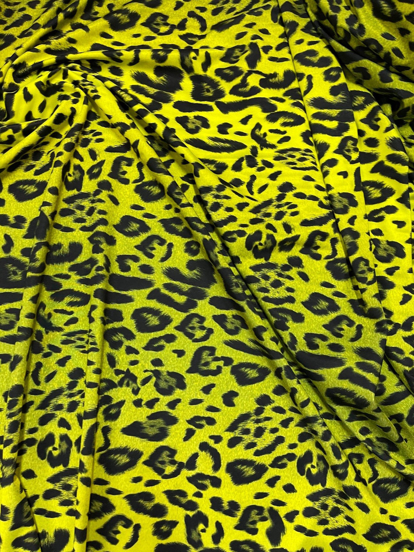 Exotic Leopard design print on ombre neon ye spandex 4-way stretch 58/60” Sold by the YD. Ships Worldwide from Los Angeles California USA.