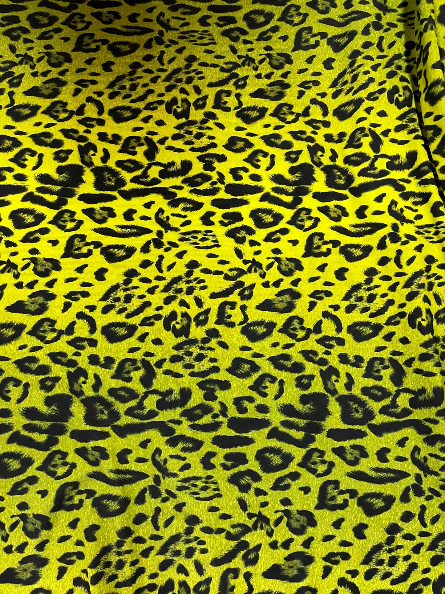 Exotic Leopard design print on ombre neon ye spandex 4-way stretch 58/60” Sold by the YD. Ships Worldwide from Los Angeles California USA.