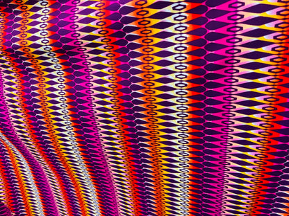 Geometric design Magenta/Multicolor print on best quality of nylon spandex 4-way stretch 58/60” Sold by the YD. Ships Worldwide