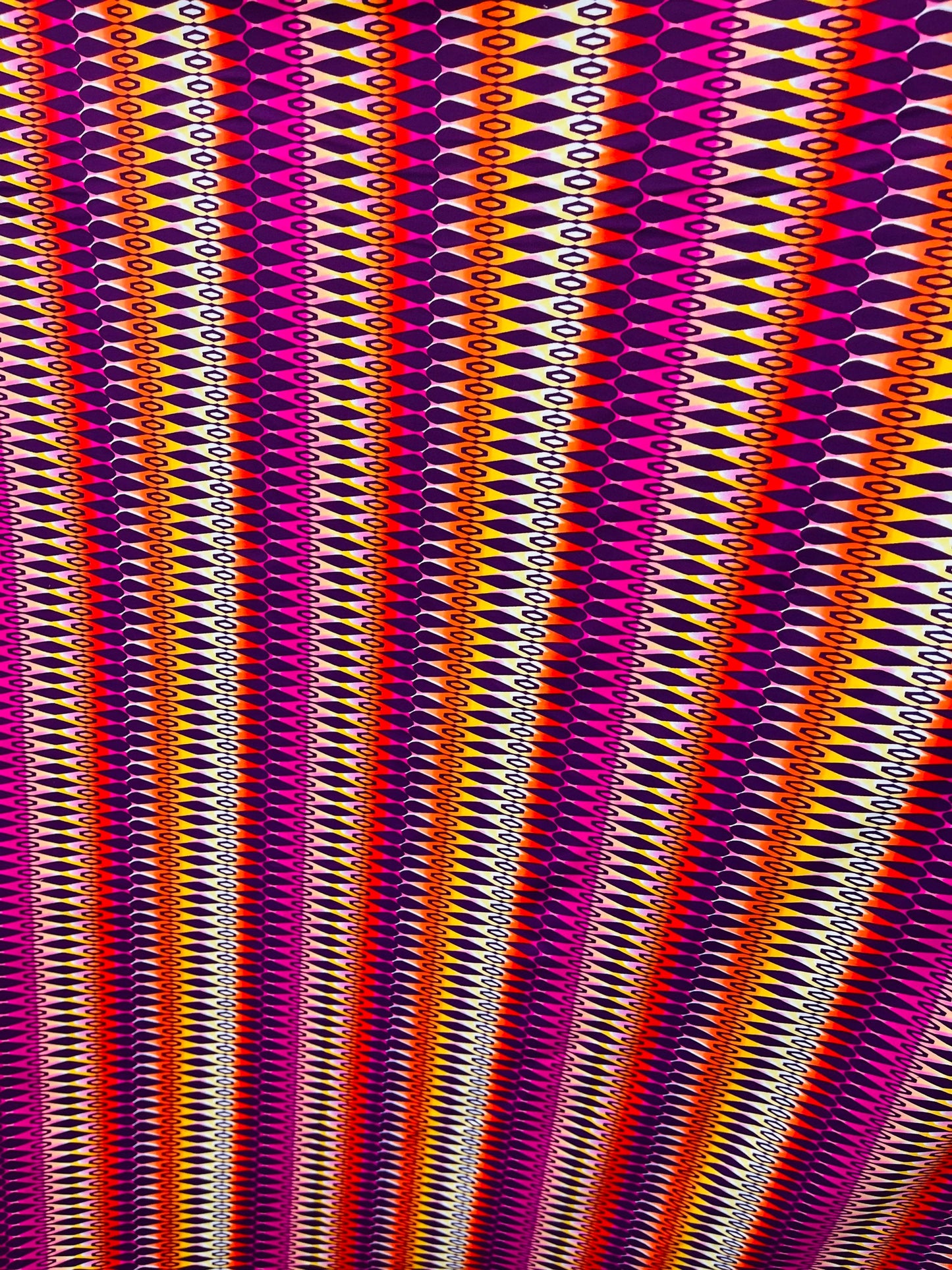Geometric design Magenta/Multicolor print on best quality of nylon spandex 4-way stretch 58/60” Sold by the YD. Ships Worldwide