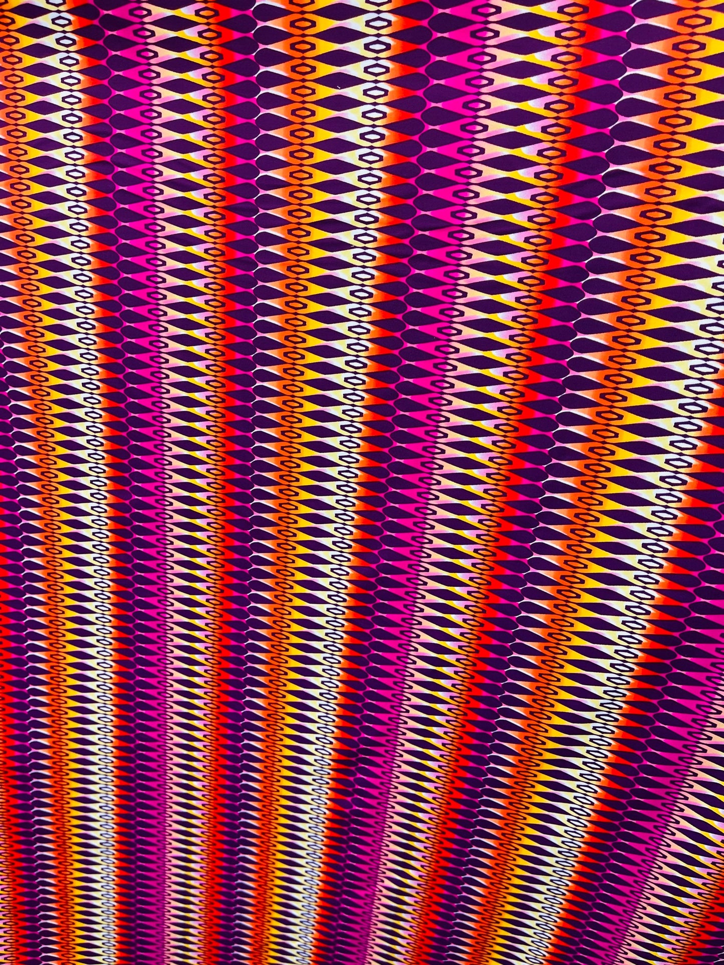 Geometric design Magenta/Multicolor print on best quality of nylon spandex 4-way stretch 58/60” Sold by the YD. Ships Worldwide