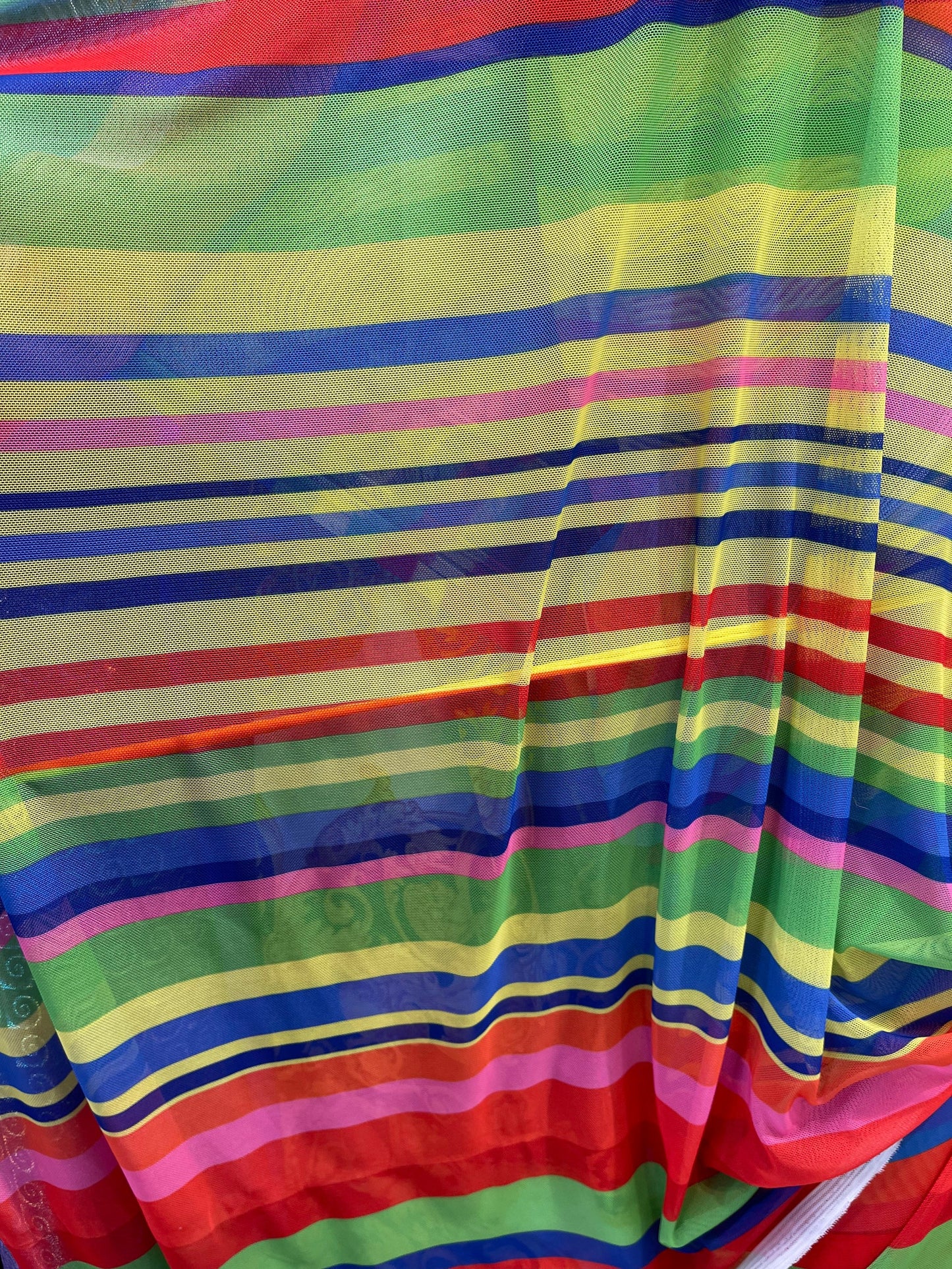 New stripe design rainbow print on power mesh 4-way stretch 58/60” Sold by the YD. Ships Worldwide from Los Angeles California USA.