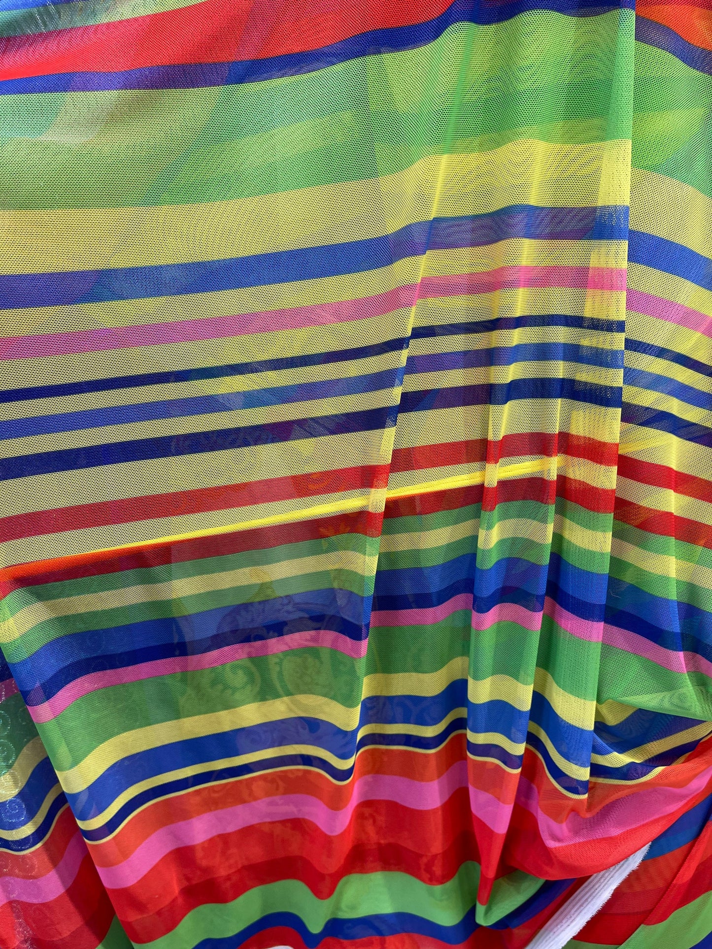 New stripe design rainbow print on power mesh 4-way stretch 58/60” Sold by the YD. Ships Worldwide from Los Angeles California USA.