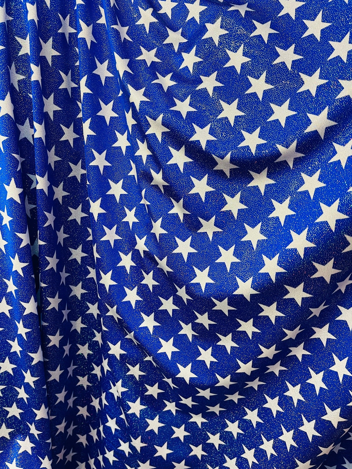 Stars design with foggy foil all over best quality of nylon spandex 4-way stretch 58/60” Sold by the YD. Ships Worldwide from Los Ángeles CA