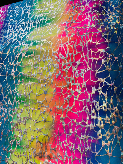 New abstract spider design rainbow hologram metallic nylon spandex 4-way stretch 58/60” Sold by the YD. Ships Worldwide from Los Angeles CA