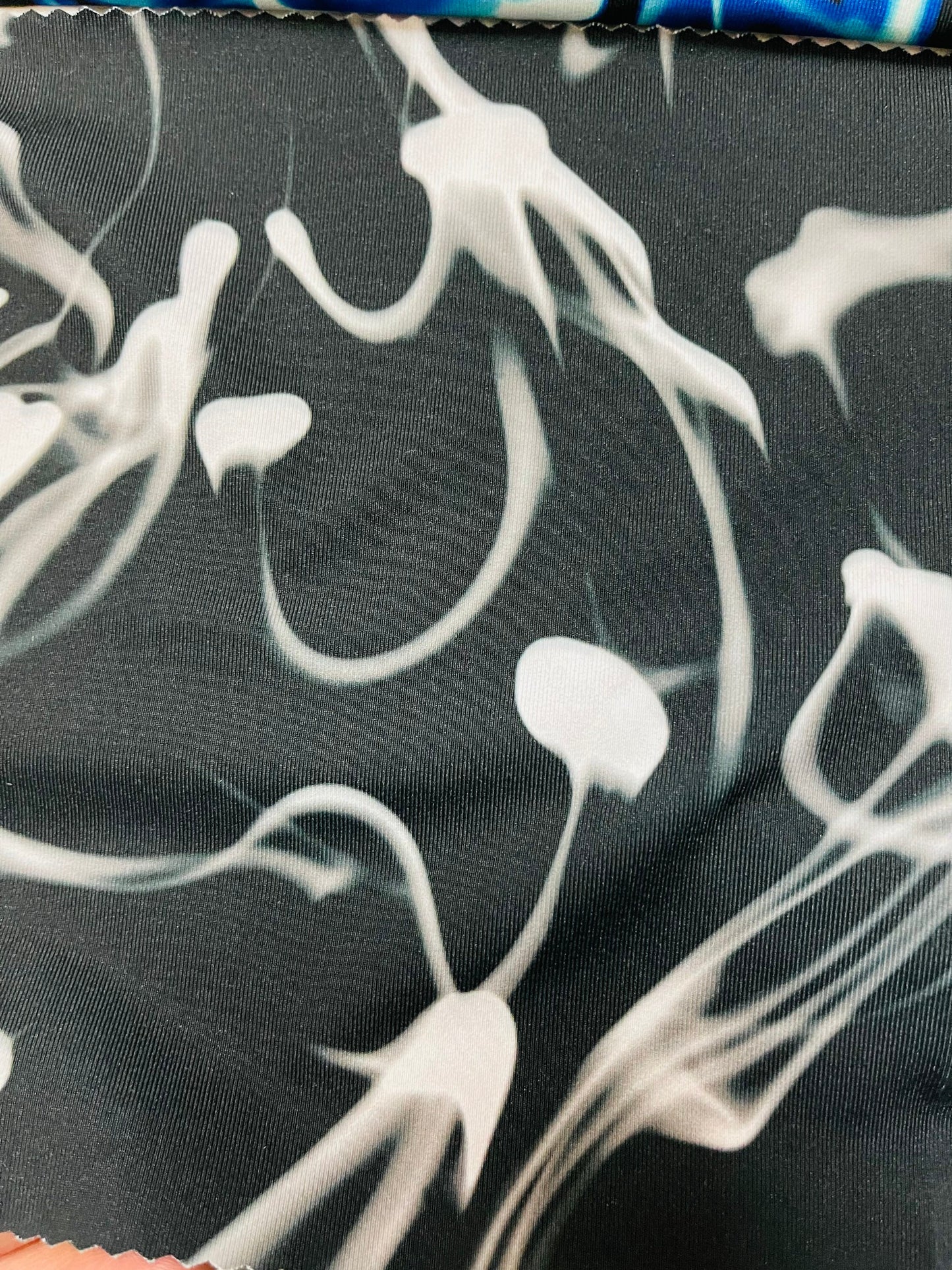 New Abstract Electric Design print on poly spandex 4-way stretch 58/60” Sold by the YD. Ships Worldwide from Los Angeles California USA.