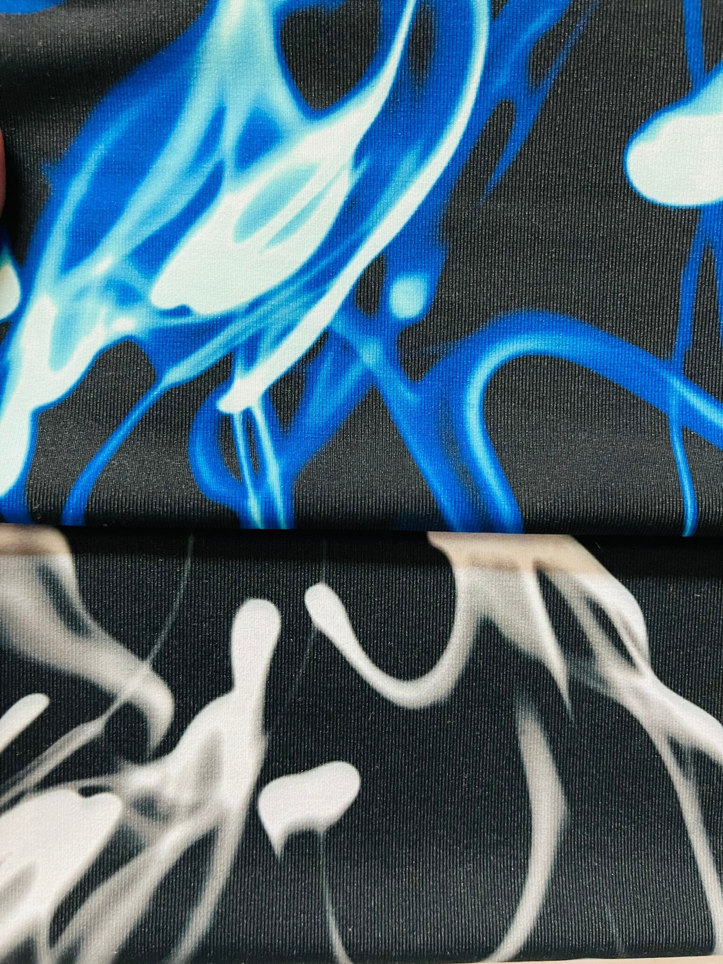 New Abstract Electric Design print on poly spandex 4-way stretch 58/60” Sold by the YD. Ships Worldwide from Los Angeles California USA.