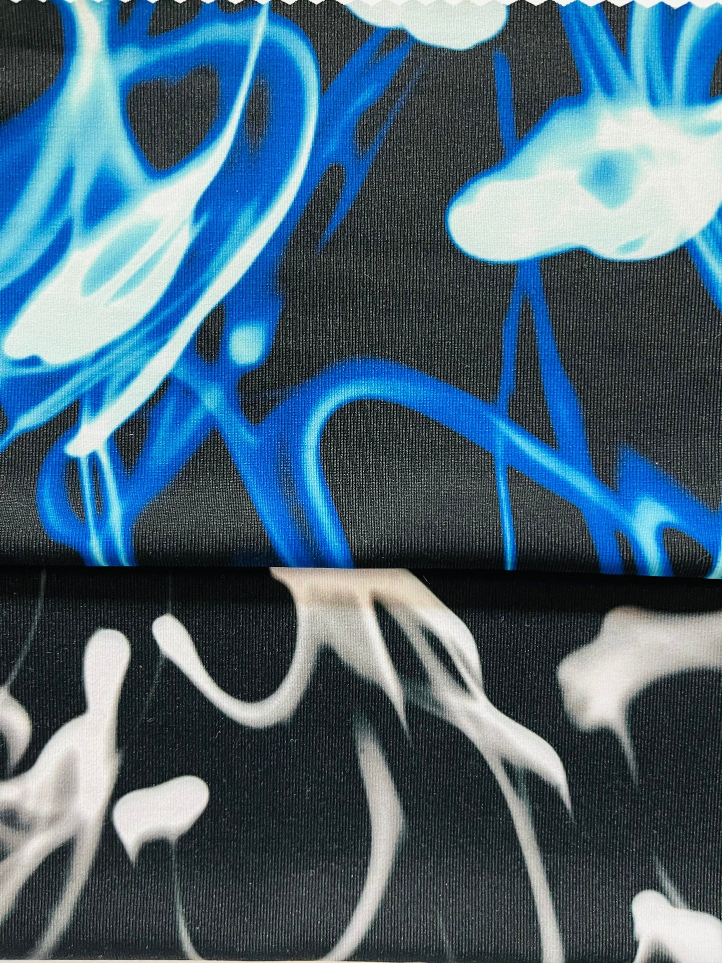 New Abstract Electric Design print on poly spandex 4-way stretch 58/60” Sold by the YD. Ships Worldwide from Los Angeles California USA.