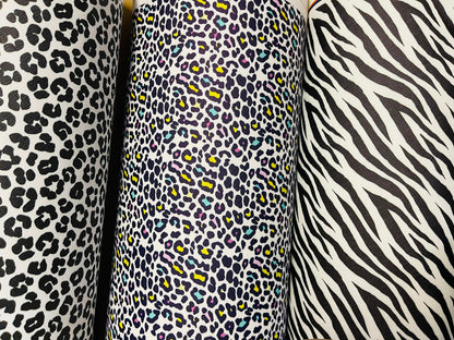 New Exotic multi animal print vinyl non stretch 57/58” Sold by the YD. Ships Worldwide from Los Angeles California USA.