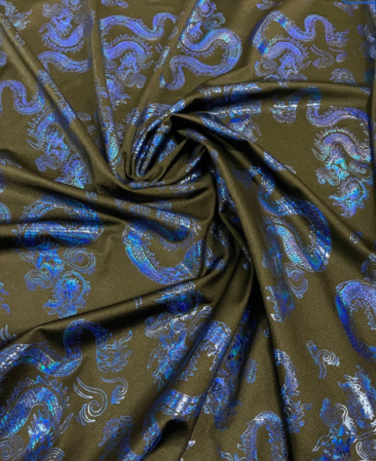 New Dragon design print on metallic nylon spandex Black Royal 4-way stretch spandex 58/60” Sold by the YD. Ships worldwide