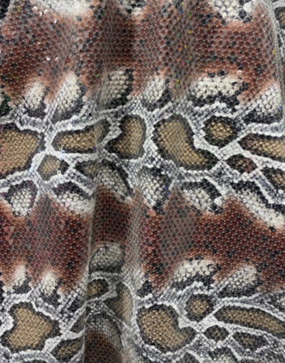 Python snake design print on poly spandex with clear sequins all over 2-way stretch 55/57” Sold by the YD. Ships Worldwide from L.A