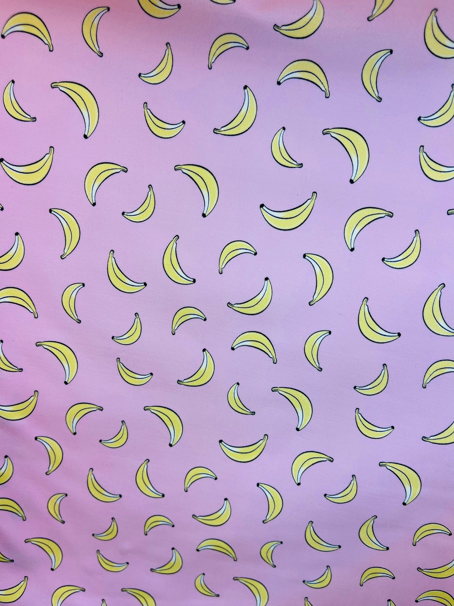 New Banana design blush/yellow print on great quality of Nylon Spandex 4-way stretch 58/60” Sold by the YD. Ships Worldwide from Los Angeles