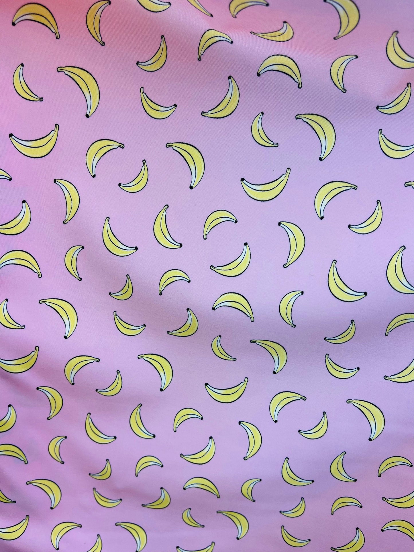 New Banana design blush/yellow print on great quality of Nylon Spandex 4-way stretch 58/60” Sold by the YD. Ships Worldwide from Los Angeles