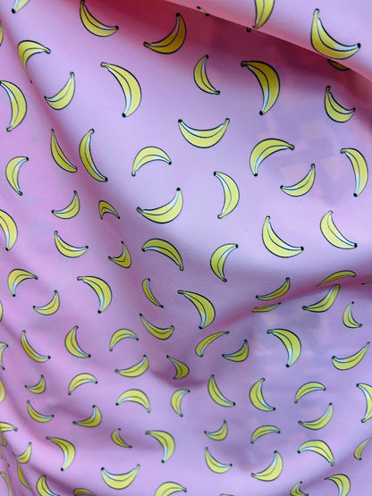 New Banana design blush/yellow print on great quality of Nylon Spandex 4-way stretch 58/60” Sold by the YD. Ships Worldwide from Los Angeles