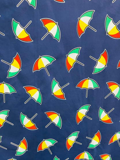 New umbrella design print on poly spandex 4-way stretch navy/multicolor 58/60” Sold by the YD. Ships Worldwide from Los Angeles California