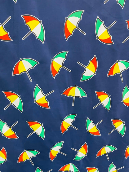 New umbrella design print on poly spandex 4-way stretch navy/multicolor 58/60” Sold by the YD. Ships Worldwide from Los Angeles California