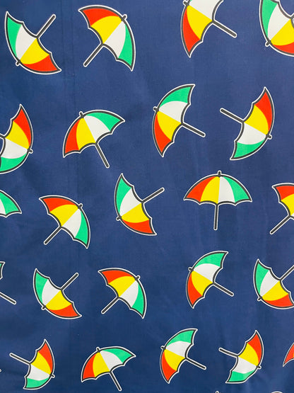 New umbrella design print on poly spandex 4-way stretch navy/multicolor 58/60” Sold by the YD. Ships Worldwide from Los Angeles California