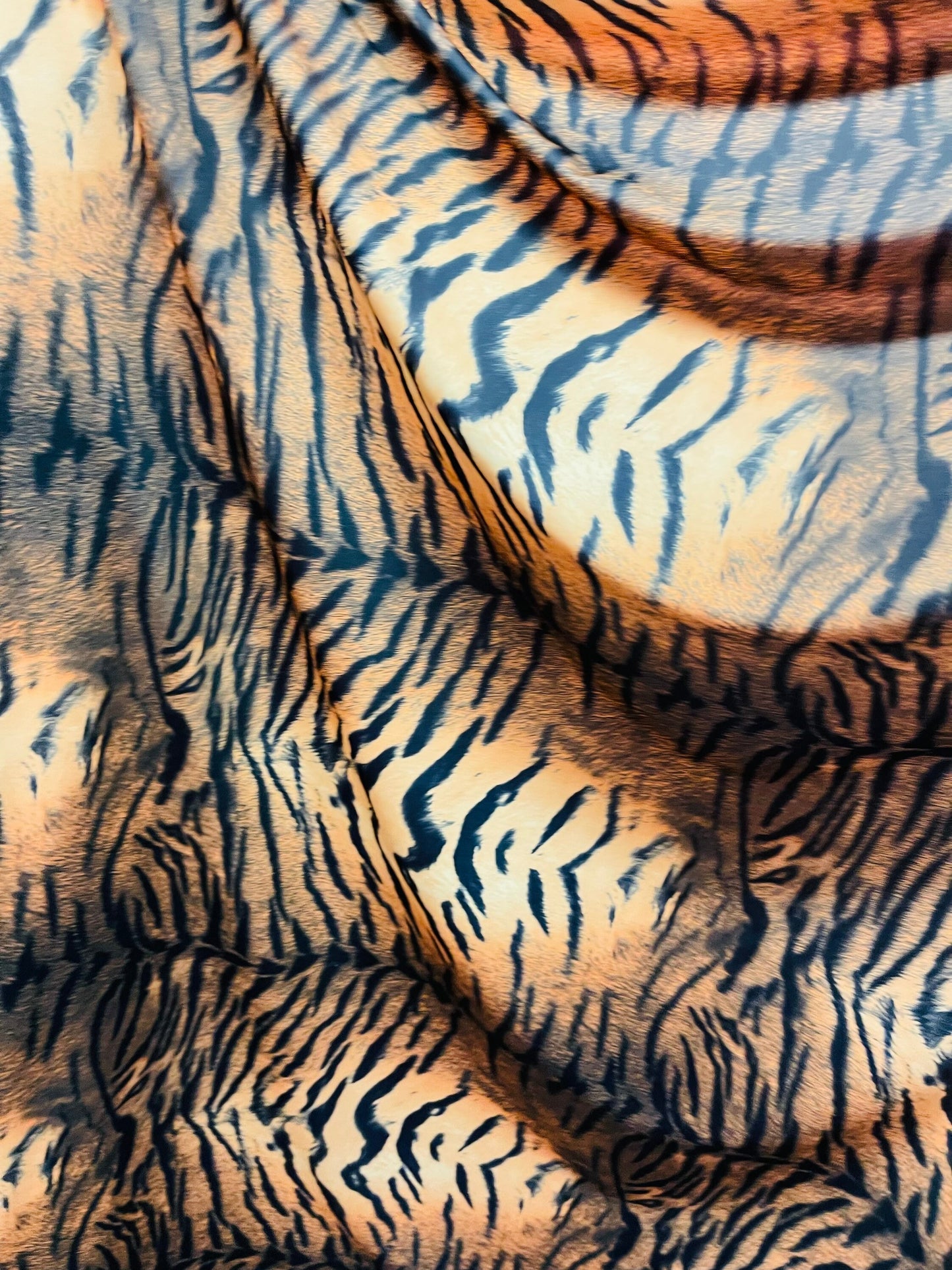 Tiger design Exotic animal print on great quality of nylon spandex 4-way stretch 58/60” Sold by the YD. Ships Worldwide from Los Ángeles CA
