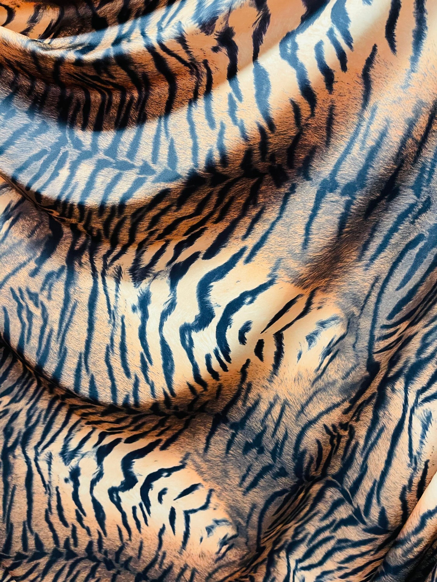 Tiger design Exotic animal print on great quality of nylon spandex 4-way stretch 58/60” Sold by the YD. Ships Worldwide from Los Ángeles CA