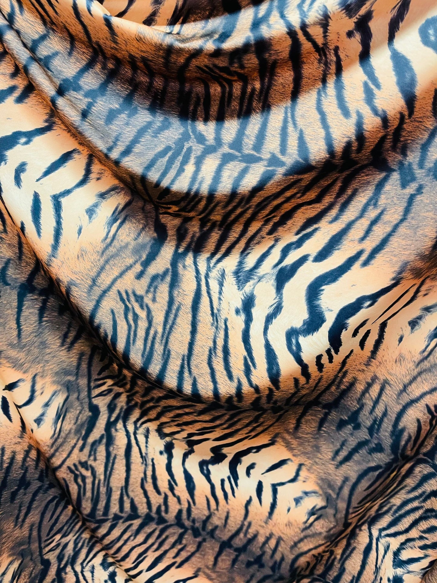 Tiger design Exotic animal print on great quality of nylon spandex 4-way stretch 58/60” Sold by the YD. Ships Worldwide from Los Ángeles CA