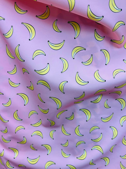 New Banana design blush/yellow print on great quality of Nylon Spandex 4-way stretch 58/60” Sold by the YD. Ships Worldwide from Los Angeles