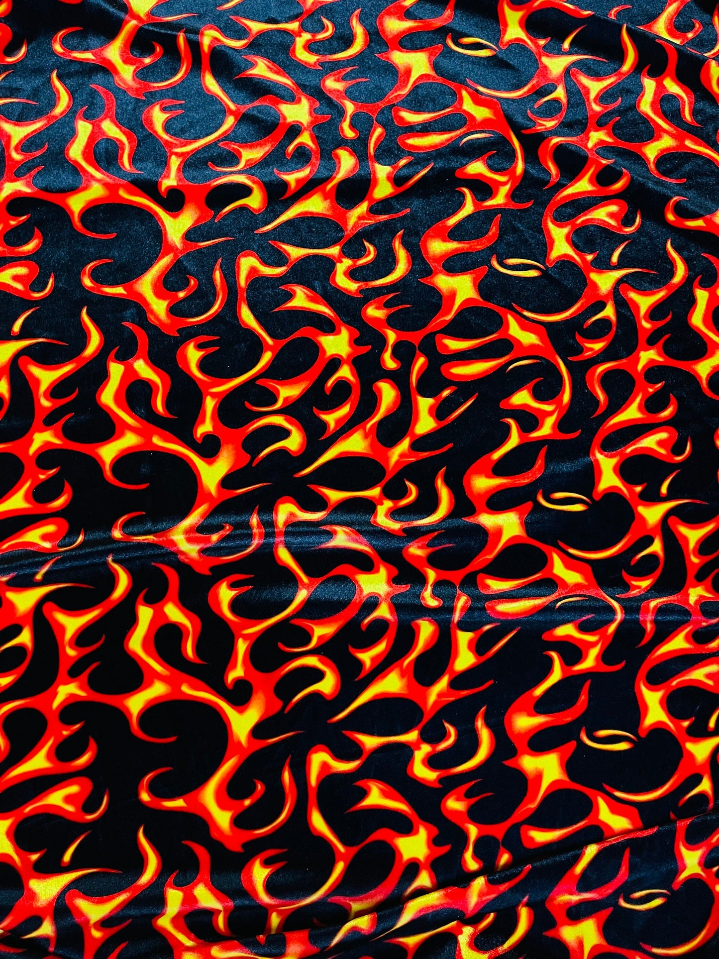 NEW Fire design Black/Red/Orange print on great quality of stretch velvet 4-way stretch 58/60” Sold by the YD. Ships Worldwide from L.A CA