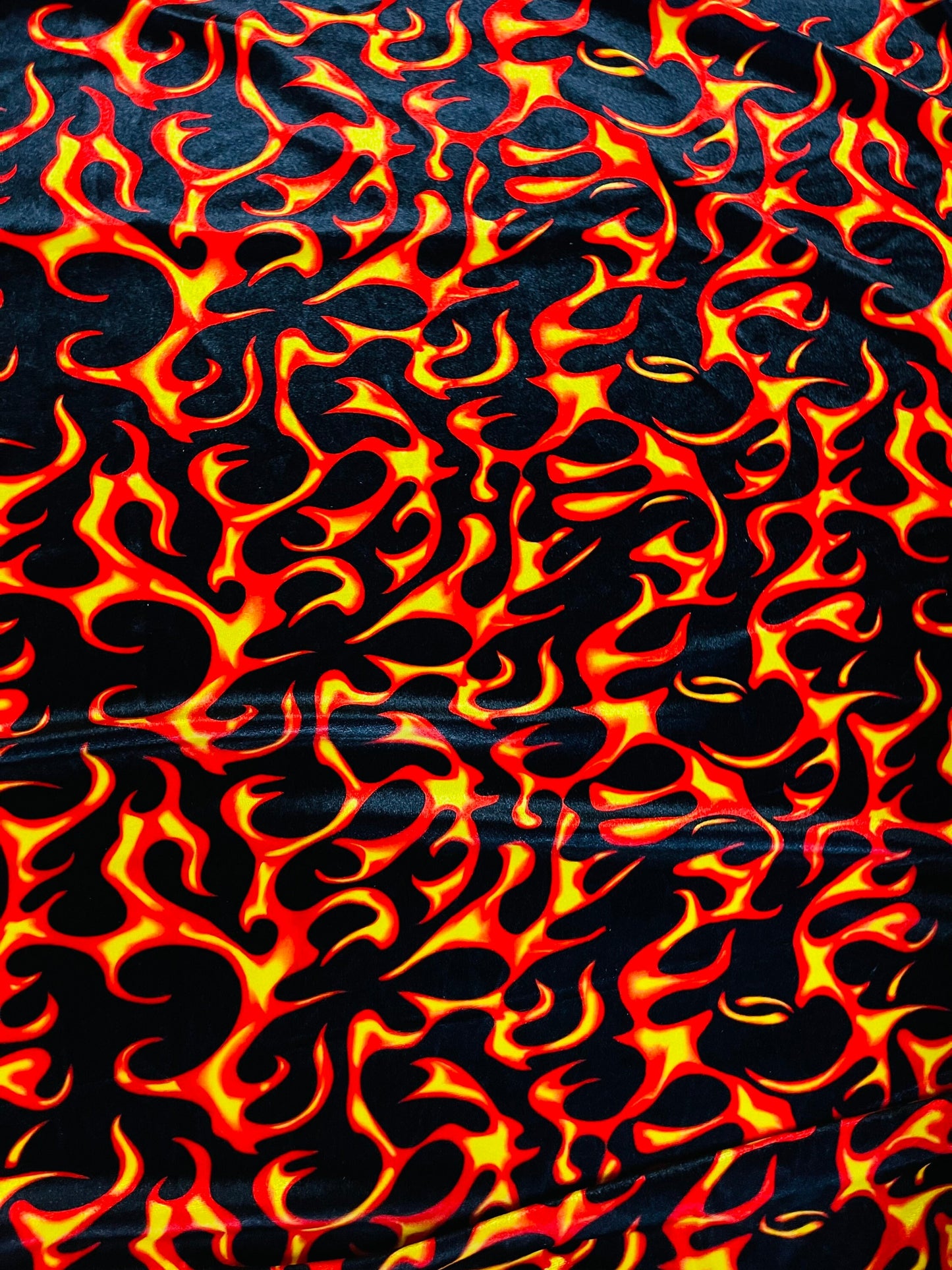 NEW Fire design Black/Red/Orange print on great quality of stretch velvet 4-way stretch 58/60” Sold by the YD. Ships Worldwide from L.A CA