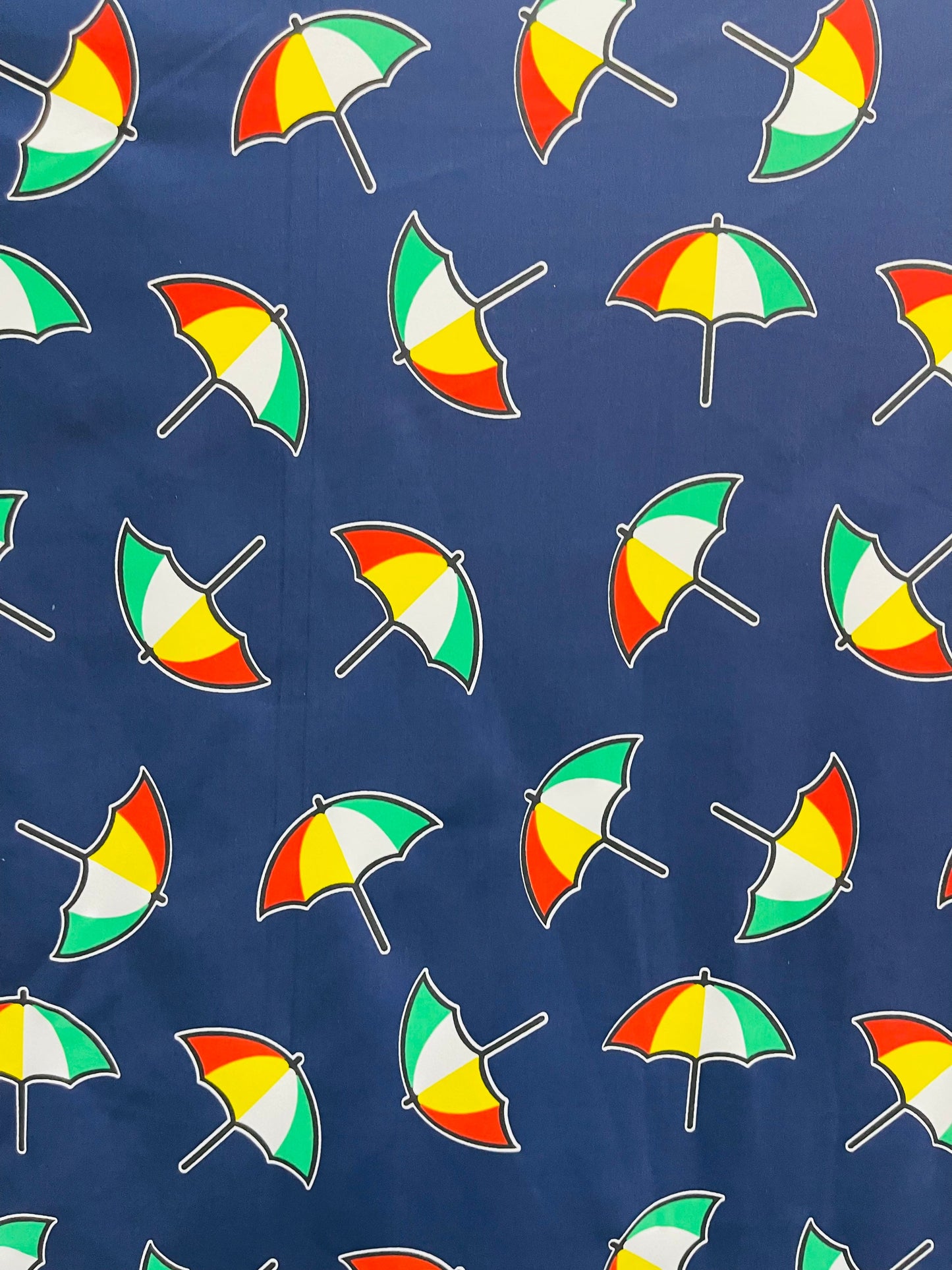 New umbrella design print on poly spandex 4-way stretch navy/multicolor 58/60” Sold by the YD. Ships Worldwide from Los Angeles California