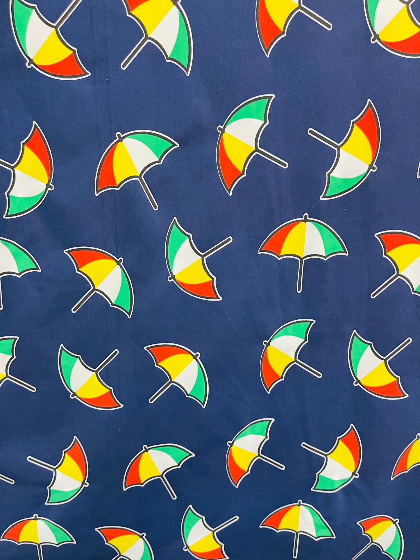 New umbrella design print on poly spandex 4-way stretch navy/multicolor 58/60” Sold by the YD. Ships Worldwide from Los Angeles California