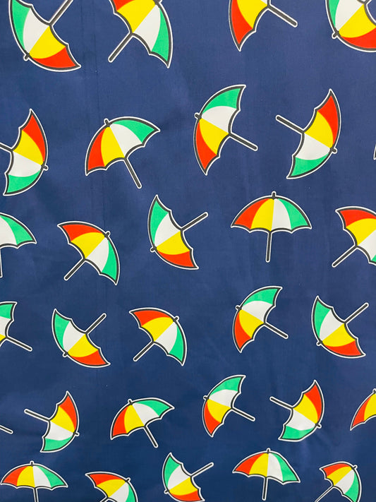 New umbrella design print on poly spandex 4-way stretch navy/multicolor 58/60” Sold by the YD. Ships Worldwide from Los Angeles California