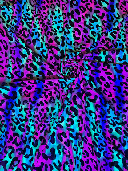 Exotic Leopard design it glows in the dark with black light print on best quality of nylon power mesh 4-way stretch 58/60” Sold by the YD.