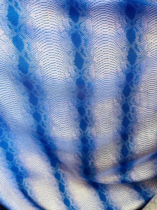 Exotic snake design sapphire 2tone print on great quality of nylon spandex 4-way stretch 58/60” Sold by the YD. Ships Worldwide from L.A CA
