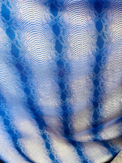 Exotic snake design sapphire 2tone print on great quality of nylon spandex 4-way stretch 58/60” Sold by the YD. Ships Worldwide from L.A CA