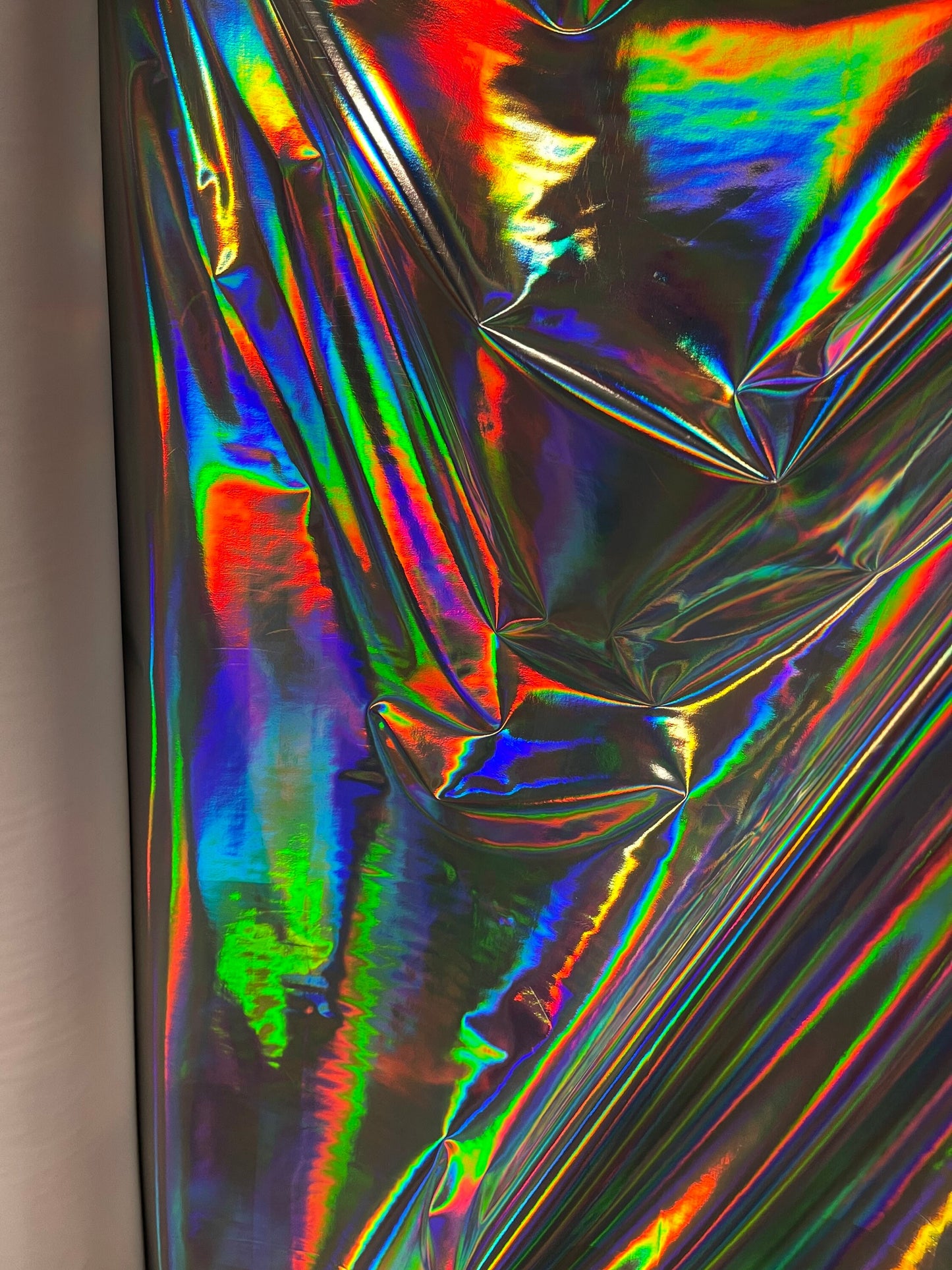 New Iridescent silver Mirror vinyl super shiny 2-way stretch 58/60” Sold by the YD. Ships Worldwide from Los Angeles California USA.