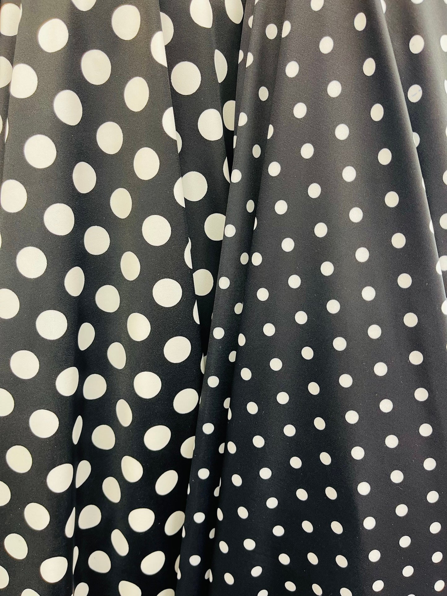 Polka dots design print on best quality of nylon spandex 4-way stretch 58/60” Sold by the YD. Ships Worldwide from Los Ángeles California