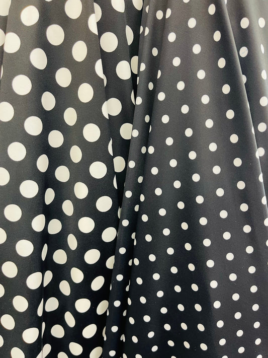 Polka dots design print on best quality of nylon spandex 4-way stretch 58/60” Sold by the YD. Ships Worldwide from Los Ángeles California