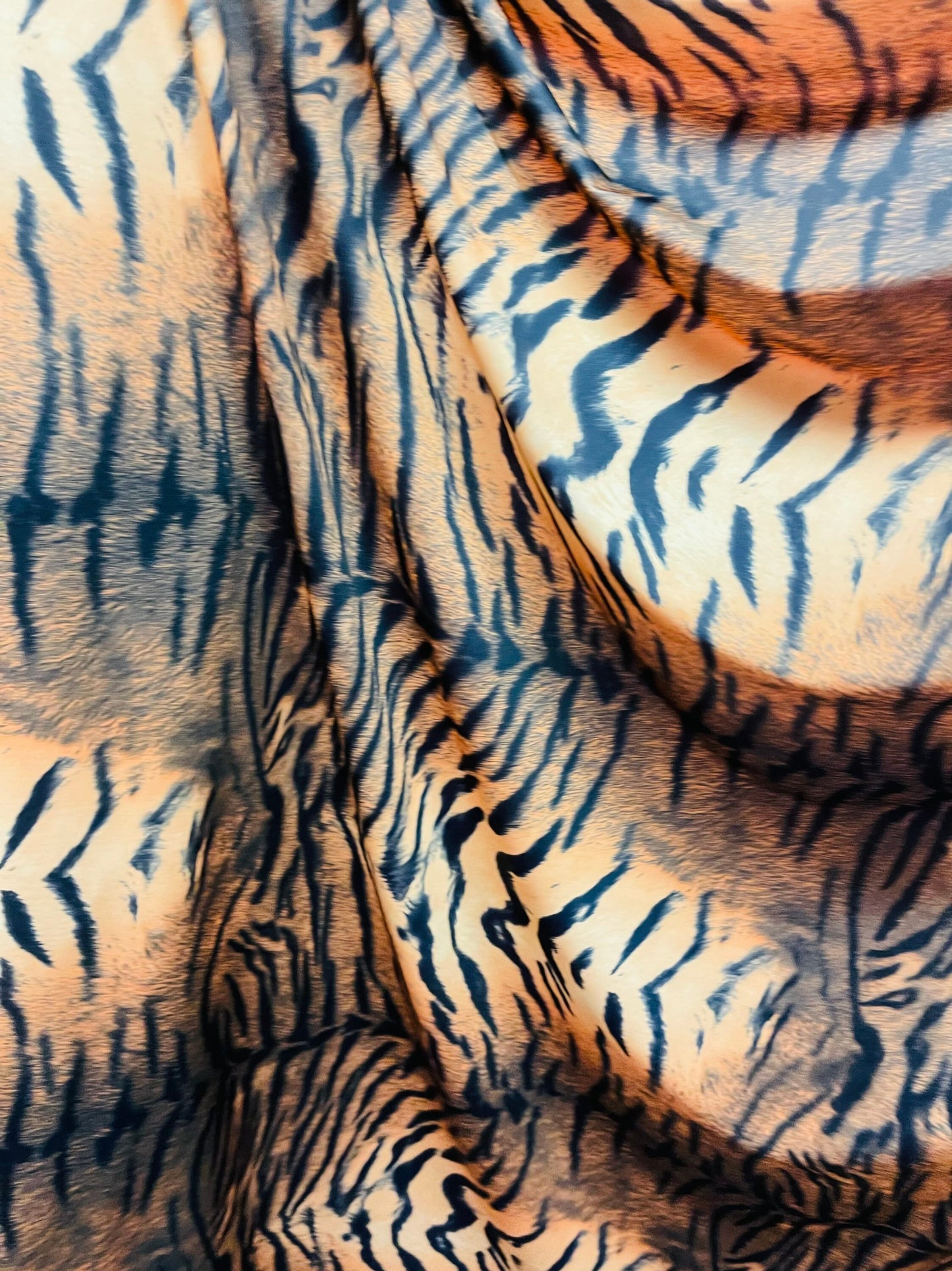 Tiger design Exotic animal print on great quality of nylon spandex 4-way stretch 58/60” Sold by the YD. Ships Worldwide from Los Ángeles CA