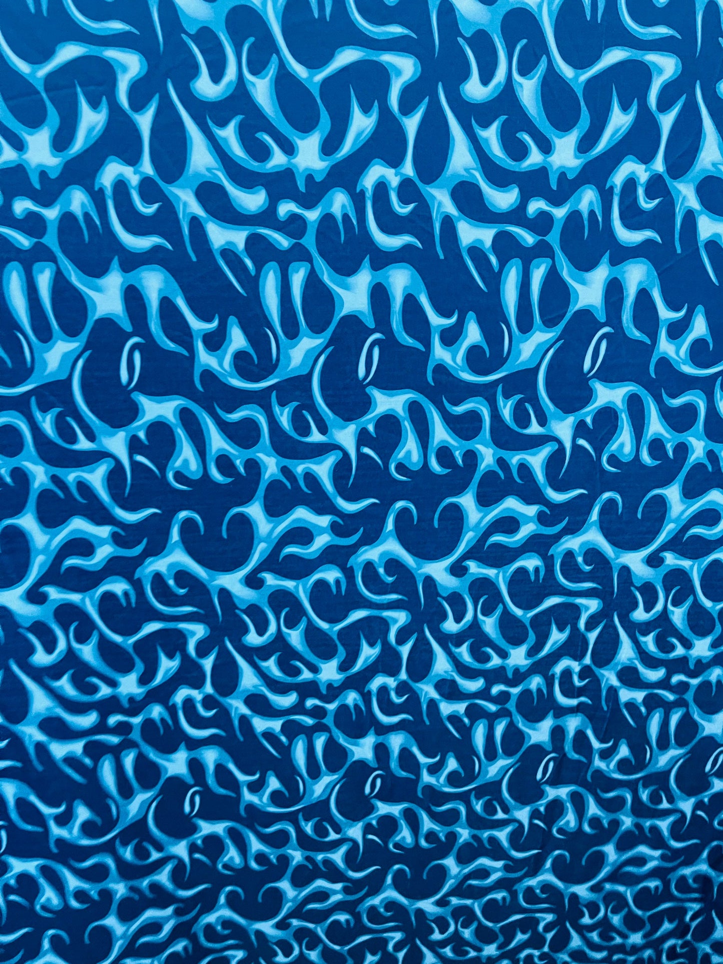 New Modern abstract flames design Blue color print on best quality of nylon spandex 4-way stretch 58/60” Sold by the YD. Ships Worldwide