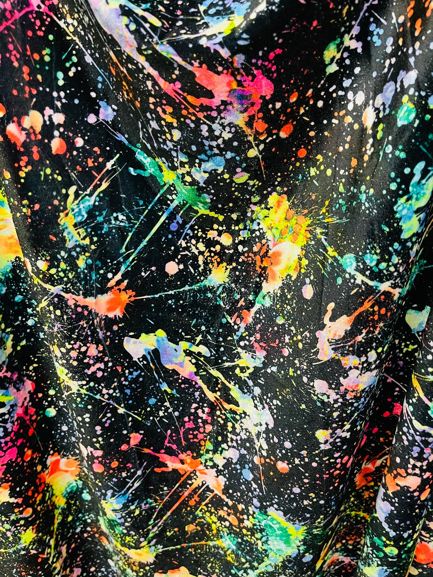 New splatter paint design Black/Multicolor print on best quality of stretch velvet 4-way stretch 58/60” Sold by the YD. Ships worldwide
