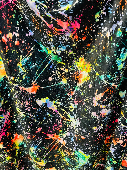 New splatter paint design Black/Multicolor print on best quality of stretch velvet 4-way stretch 58/60” Sold by the YD. Ships worldwide