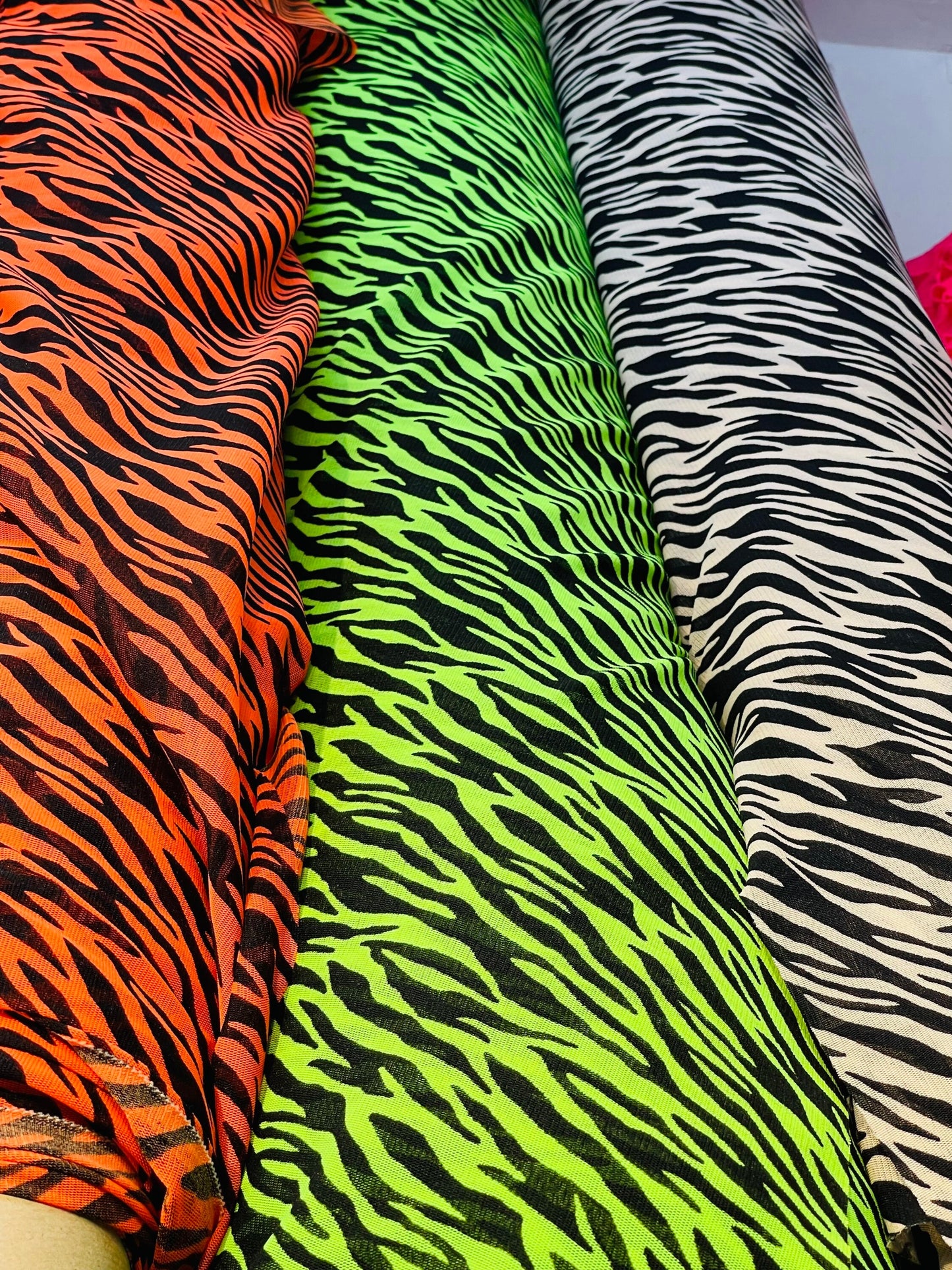 New Exotic Zebra design print on great quality of stretch mesh 4-way 58/60” Sold by the YD. Ships Worldwide from Los Angeles California USA.
