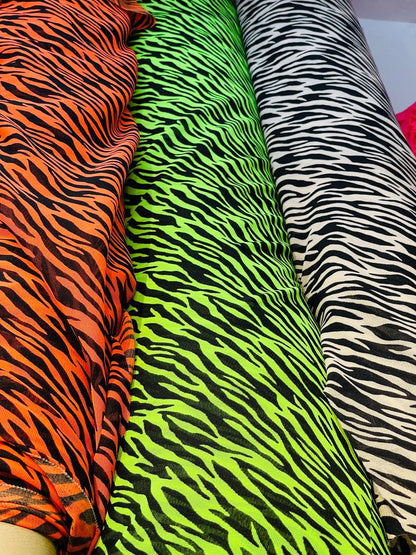 New Exotic Zebra design print on great quality of stretch mesh 4-way 58/60” Sold by the YD. Ships Worldwide from Los Angeles California USA.