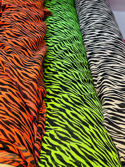 New Exotic Zebra design print on great quality of stretch mesh 4-way 58/60” Sold by the YD. Ships Worldwide from Los Angeles California USA.